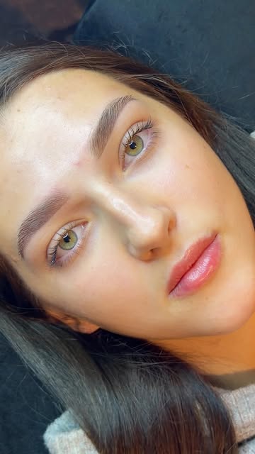 Client showing lip blush and defined brows from Alexsia's portfolio